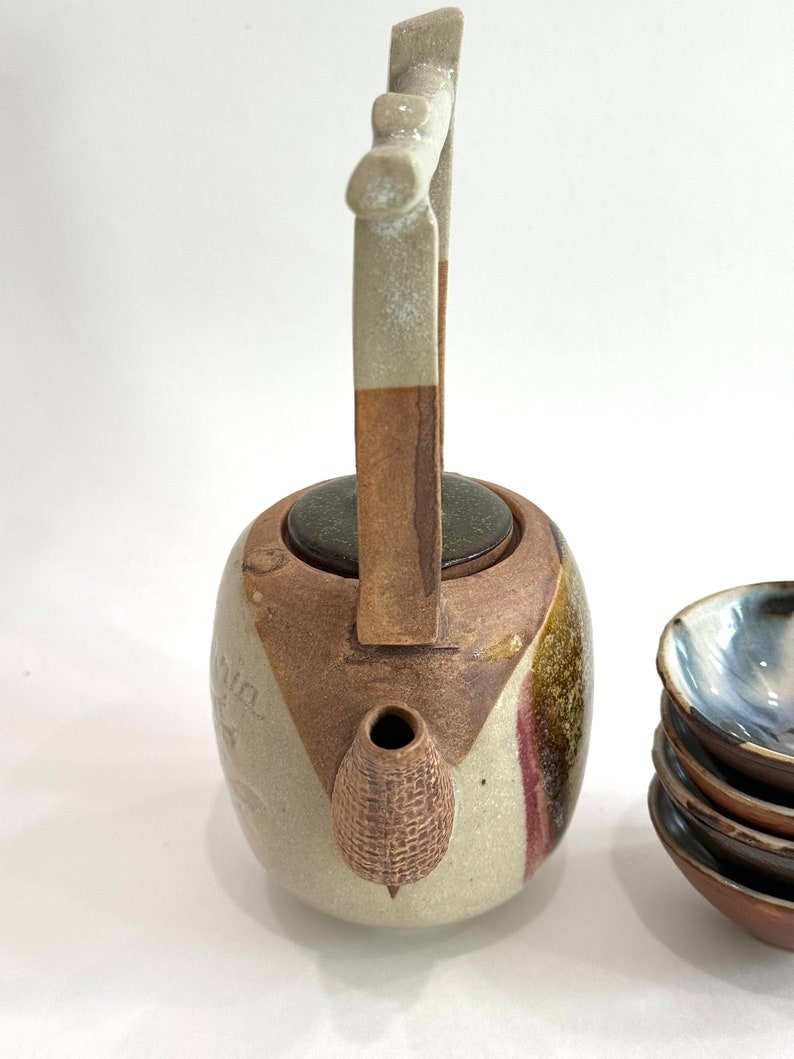 Rare, water well handle Japanese teapot with four tiny teacups in white, blue and maroon glaze. Hand glazed stoneware mini teapot. Signed on the bottom. Estate decor. Tea ceremony sets.