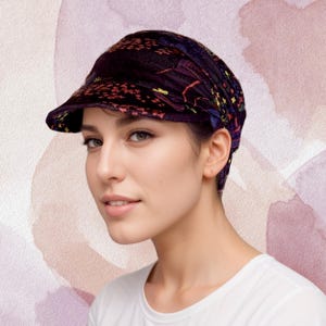 Full coverage cap, chemo headwear, soft lightweight and ultra comfortable fabric and designed with ruching for a relaxed look, black pattern