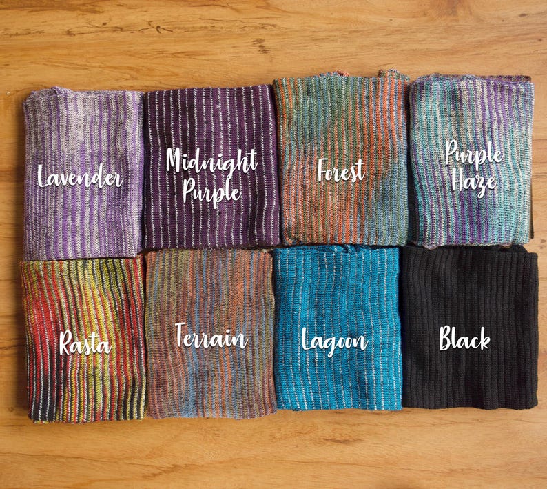 May include: Eight different colored striped fabric swatches with the names "Lavender", "Midnight Purple", "Forest", "Purple Haze", "Rasta", "Terrain", "Lagoon", and "Black" written on them.
