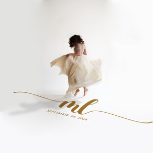 May include: A person wearing a flowing, cream-colored dress, captured in motion against a white backdrop. The dress billows around the person as they turn. Gold script reads "ml" and "September 24, 2024".