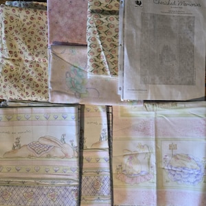 May include: Assortment of fabric pieces with floral and bunny patterns. Some fabrics have pink and yellow floral prints, while others feature bunnies with the text "moments are memories". A pattern sheet titled "Cherished Memories" is also included.