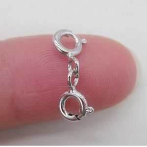 May include: Silver-toned lobster clasp with a jump ring. The clasp is designed to be used for jewelry making.