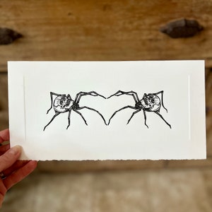 Spiders with skull design. Arachnid original linocut print on heavyweight handmade paper.