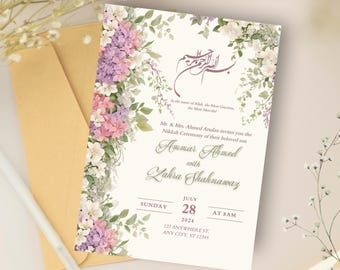 May include: Wedding invitation with floral accents in pink, purple, and white. The invitation includes the names Ammar Ahmed and Zahra Shahnawaz, along with the date and time of the ceremony. A matching envelope is included.