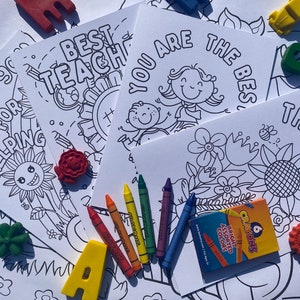 May include: A collection of white coloring pages with the phrases "Thank You", "Best Teacher", and "You Are The Best". The pages are surrounded by colorful crayons and decorative erasers, perfect for a teacher appreciation gift.