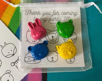 May include: A sheer white drawstring pouch containing four animal-shaped crayons in pink, green, blue, and yellow. A white card inside the pouch features the text Thank you for coming to my party !!! and black line drawings of various animal faces.