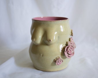 Pink roses boob/tit vase in body shape and curves glazed with shiny mint and pink interior. Detailed flower sculpture attachment
