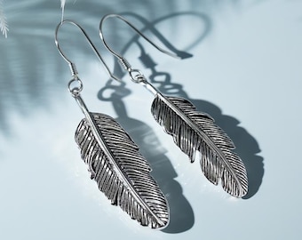 Sterlingzilveren verenoorbellen: antieke boho-hangerhangers