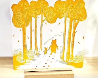 Atrapasol de Winnie the Pooh - Impresión en linóleo naranja sobre acrílico. Pooh y Piglet. Luce precioso con la luz. Un regalo ideal para expresar amor y amistad.