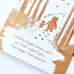 Winnie the Pooh BFF Card - lino print in gold with quote "We'll be friends forever, won't we Pooh?" asked Piglet "Even longer". Friends card