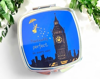 Espejo compacto de Mary Poppins prácticamente perfecto. Con linograbado de Poppins sobre el Big Ben y Londres y cita. En caja de regalo. Ideal como regalo de cumpleaños.