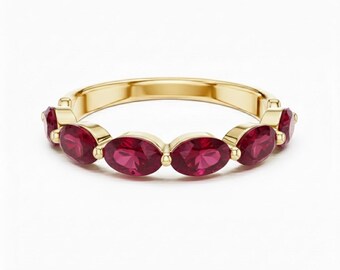 18kk Gold Oval Cut Ruby Half Eternity Band