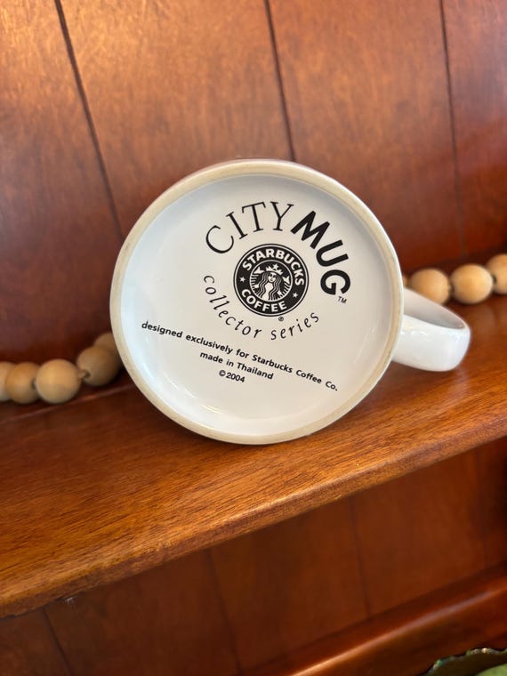 Vintage 2004 Starbucks Taiwan mug. city series. holds 18 fluid oz. New,  unused, kept on a shelf. A great collector gift.these go quick