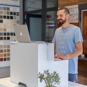 Active Stand A Simple Standing Desk Converter Convert Your Desk Into A Standing Desk Easily Made of sturdy cardboard EU image 2