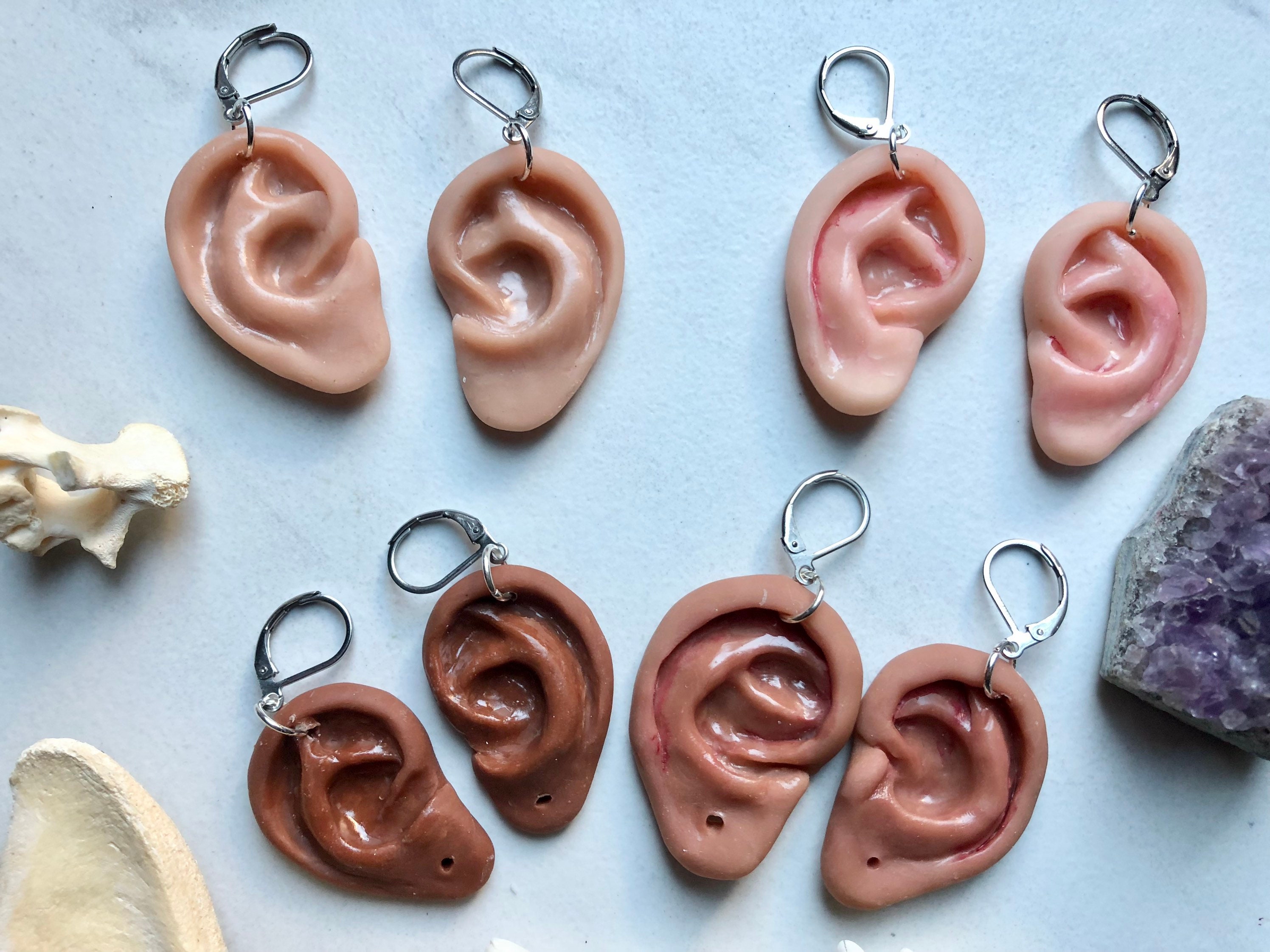 Strange earrings sale