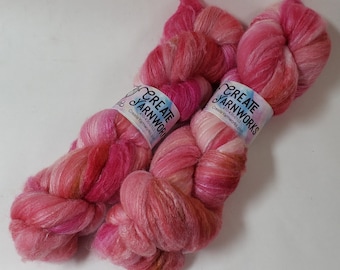 Pretty in Pink in Polwarth/Tussah Silk 67/33 custom blend top 4oz vlecht