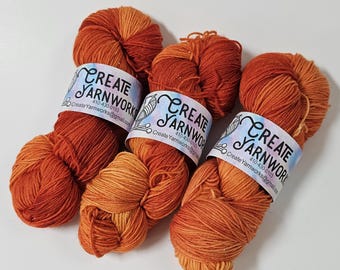 Pumpkin in Gold Sparkle Superwash Merino Blend Fingering Weight Yarn