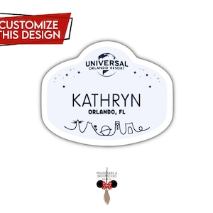 May include: A white name tag with blue text that says "Universal Orlando Resort" and "Kathryn Orlando, FL". The tag has a blue outline and a small blue drawing of a palm tree and a castle.