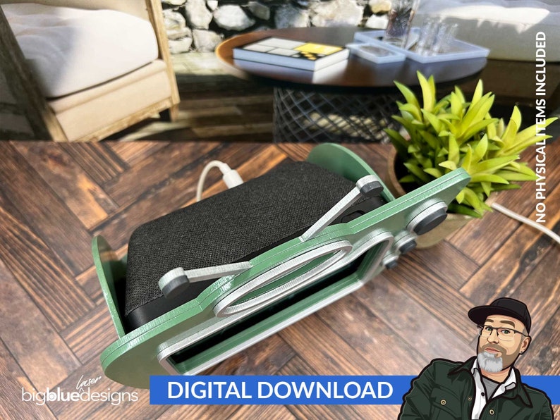 May include: A green and silver wooden stand designed to hold a smart speaker. The stand has a retro design with a circular cutout and a small shelf for the speaker's power cord. The stand is sitting on a wooden surface.