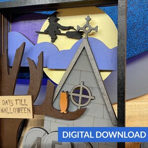 May include: A digital download of a Halloween countdown shadow box with a witch flying on a broomstick, a spooky house, and an owl. The countdown is set to 45 days until Halloween.