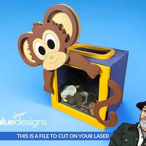 May include: A wooden monkey money box with a yellow and blue box. The monkey has brown fur and large eyes. The box has a slot for coins and a clear window to see the coins inside. "This is a file to cut on your laser" is written below the image.