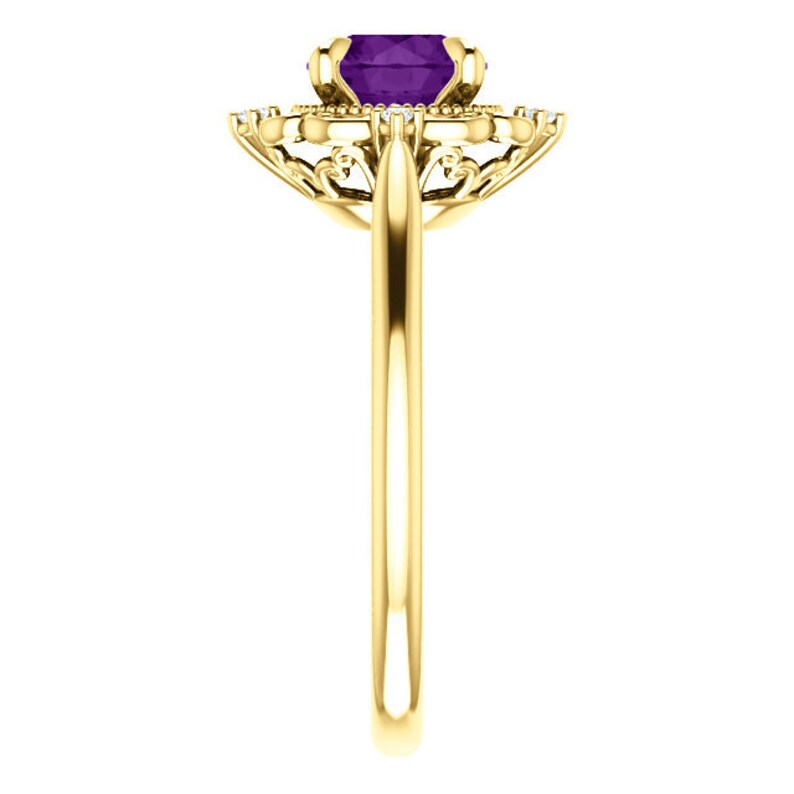 May include: A gold ring featuring a purple gemstone encircled by smaller diamonds. The ring has a delicate, intricate design.