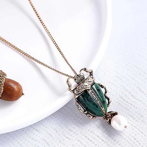 iridescent green faux pearls Egyptian Scarab Beetle Antiqued Brass Necklace 