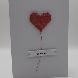 Biglietto "Ti amo" con un cuore irigami