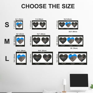 May include: A size guide chart titled CHOOSE THE SIZE displaying nine black-framed wall art options with heart-shaped map cutouts. Sizes range from 16 by 17.5 cm to 76 by 32 cm, featuring one, two, or three hearts with text labels below.