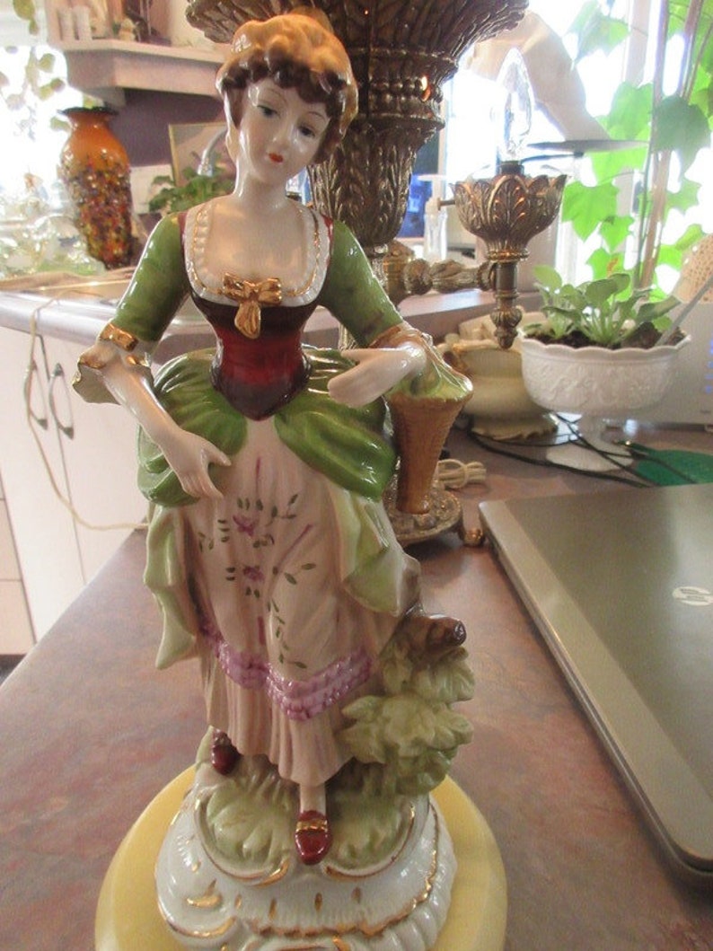 77 vintage Porcelain lamp Antique wladies 28.5 in tall x 7 in wide 1974