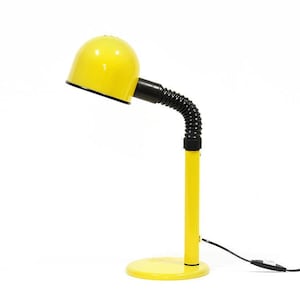 Bright yellow desk lamp from Alda, Sweden. Good vintage condition from 1970s.
