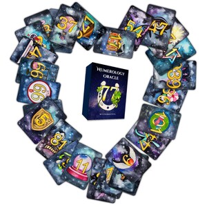 May include: A set of 77 cards with a galaxy background and gold numbers. The cards are arranged in a heart shape around a box that says "Numerology Oracle 77".