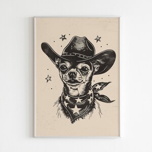 May include: Black and white illustration of a Chihuahua wearing a cowboy hat and bandana with star patterns. The artwork is framed and set against a beige background, with stars scattered around the dog's head.
