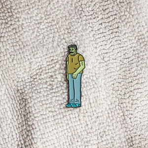 Ugly Americans: Randall Skeffington Soft Enamel Pin