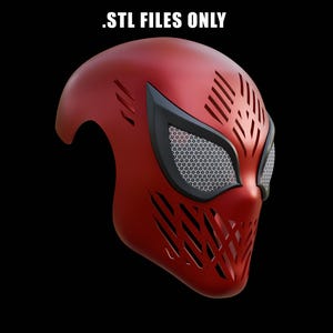 May include: A red mask with black accents and a mesh eye covering. The mask has a complex design with angled cutouts and the text ".STL FILES ONLY" at the top. The mask is set against a black background.