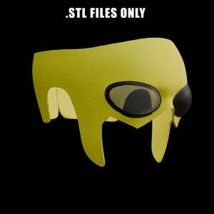 Puede incluir: Un casco amarillo con dos agujeros para los ojos de malla negra. El casco tiene una superficie texturizada y un diseño único.