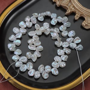 High-Luster Thick Petal Pearl with Cool Glow, 8-9mm, Three-Seven Hole Natural Nucleus-Free Baroque Pearl  wholesale Freshwater Pearls