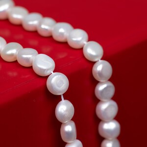 White Freshwater Pearl Strand: 4-5mm Potato Beads