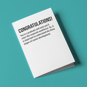 May include: A white greeting card with the word "CONGRATULATIONS!" in bold black letters. The card includes text about career development for graduates. The card is on a teal background.