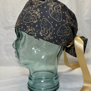 Ponytail Scrub Cap - Black and Gold Anatomical Heart