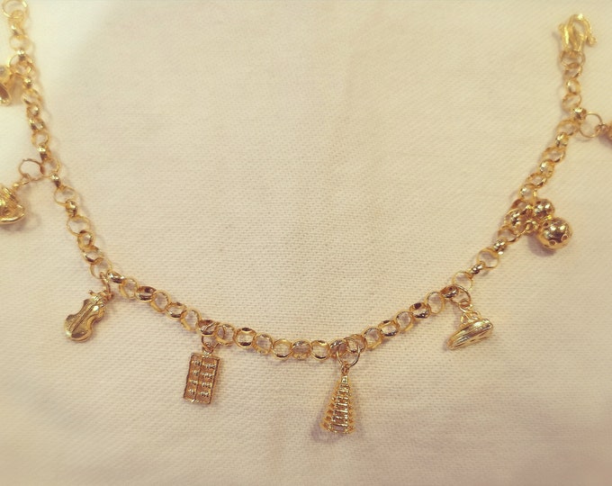 Eight Treasure Charms Solid Gold Bracelet