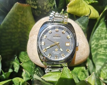 Vintage Mondia 9 Black Face Gold Dial Watch