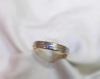 Double waves Inspired Platinum and Yellow Gold band