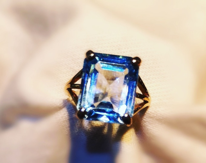 Blue Topaz Emerald cut Gold Ring