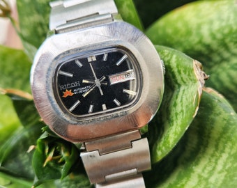 Vintage Ricoh Sakura Black face Watch