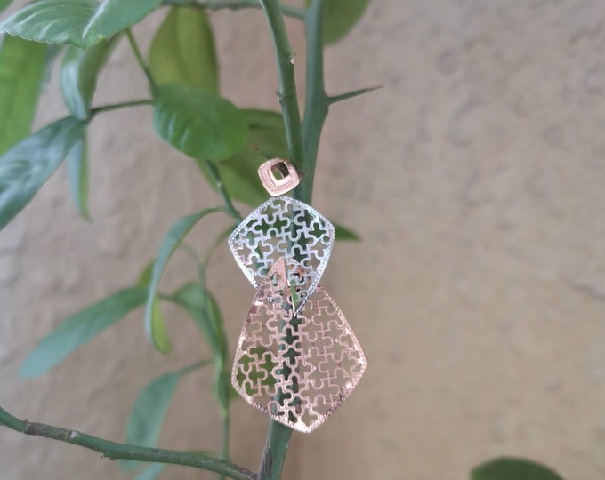 Puzzle motif Two Toned Gold Pendant