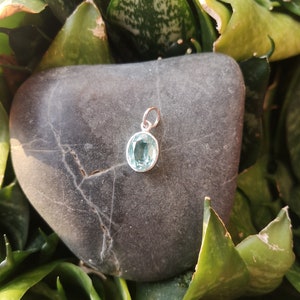 Handmade Silver Pendant set with Ocean blue stone