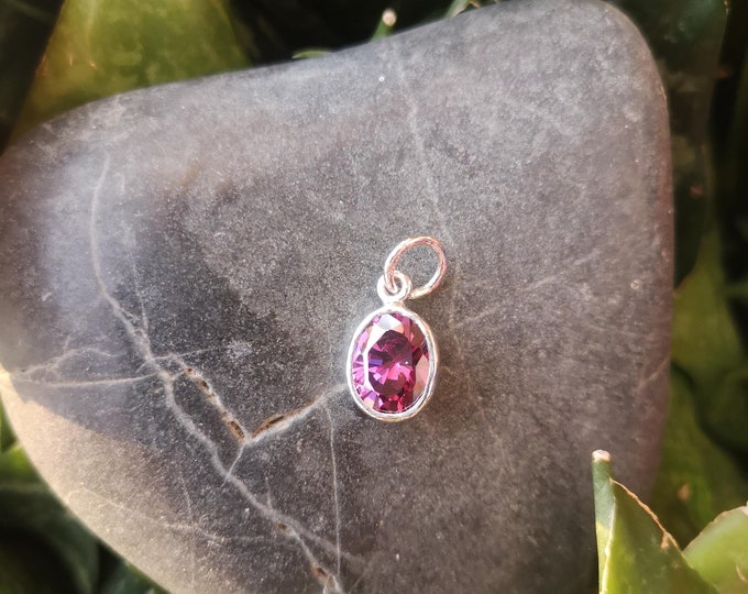 Hand crafted Silver Pendant/Charm set with Purple stone