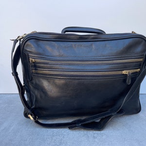 Sac style porte-documents en cuir noir épais avec bandoulière longue