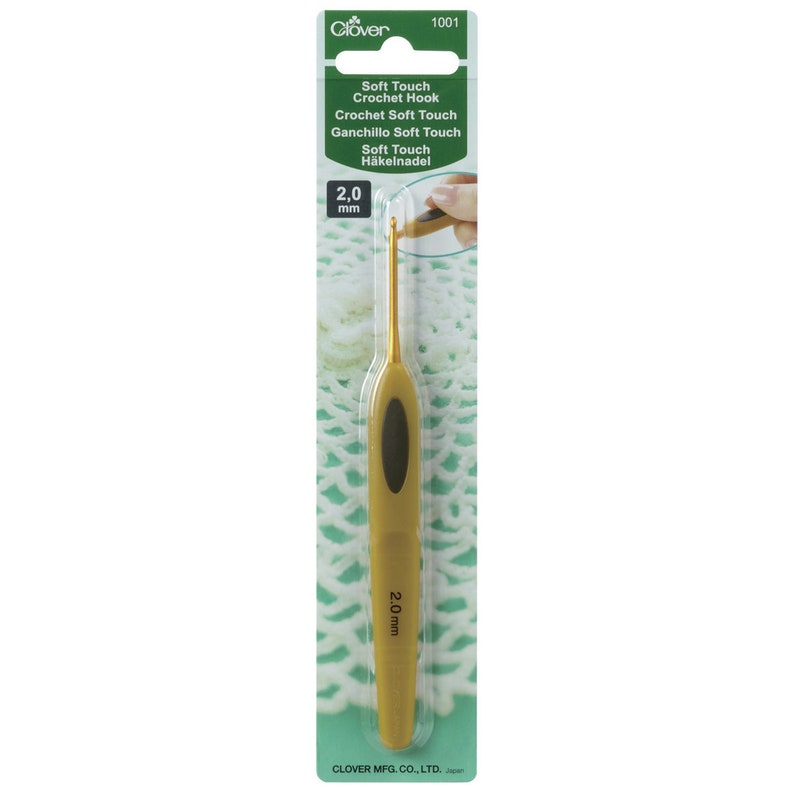 May include: A gold-coloured crochet hook with a black handle. The hook is labelled "Soft Touch Crochet Hook" and "2.0 mm".